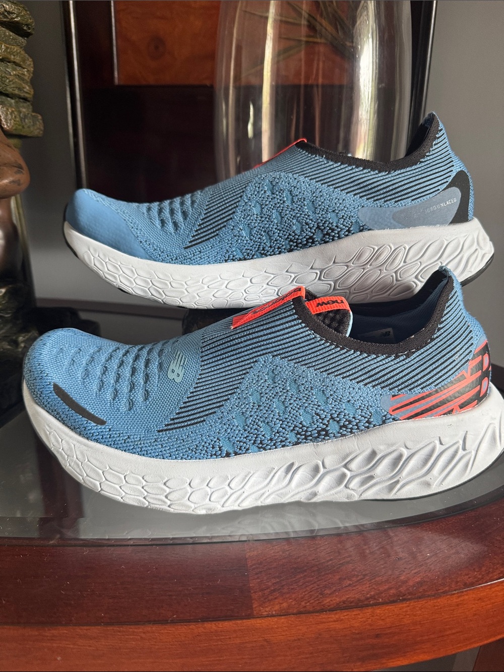 New Balance Sky Blue Slip-On Knit Sneakers with Coral Accents
